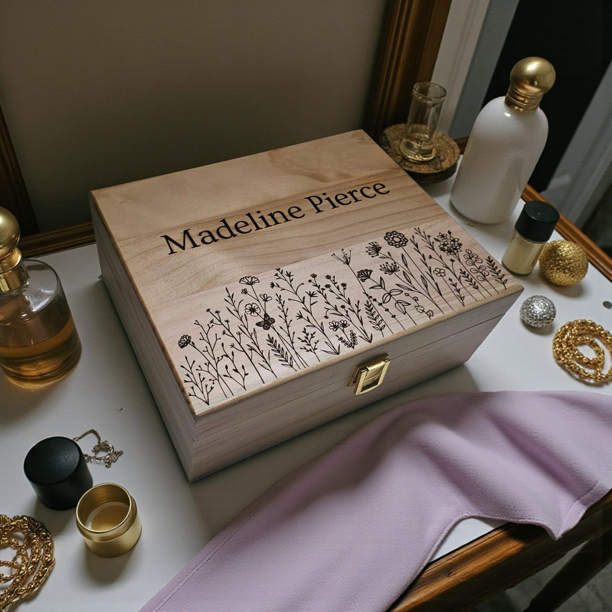 Newfashioned Relics personalized wooden keepsake box with engraved wildflower design and name on a vanity table