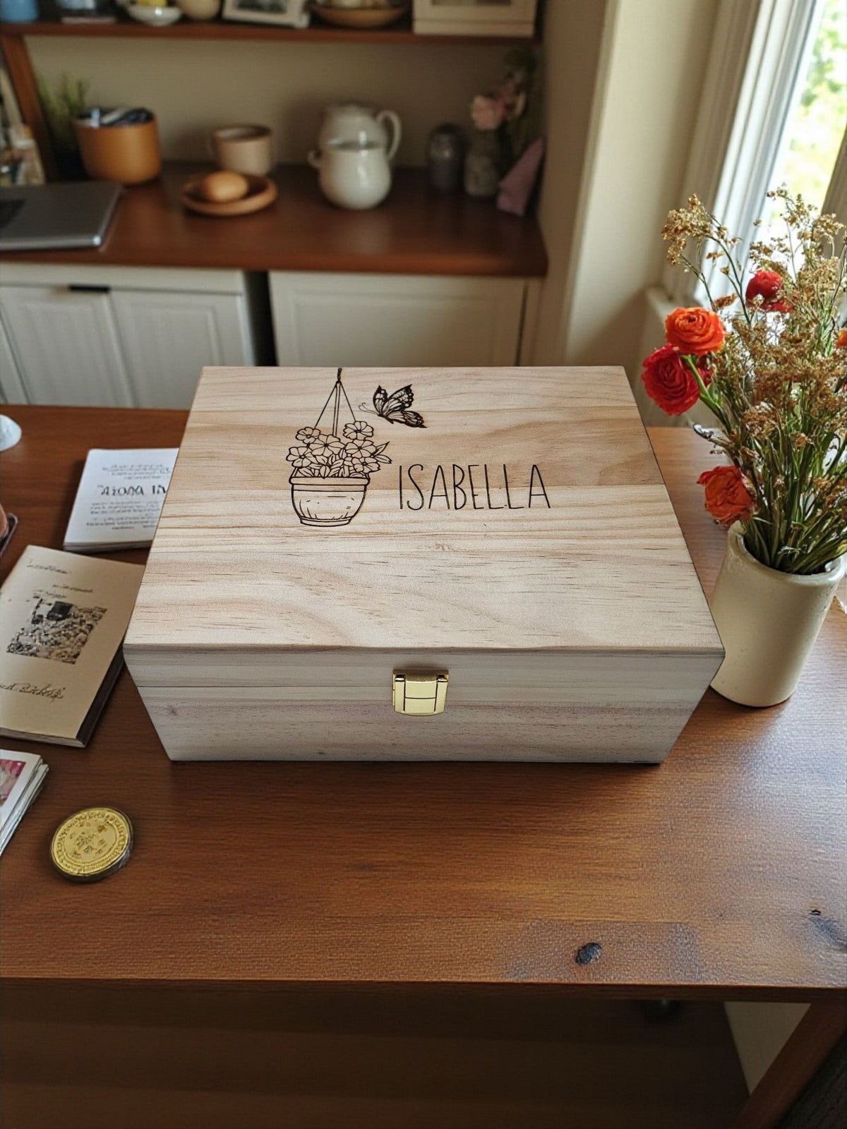 Newfashioned Relics personalized wooden keepsake box with engraved butterfly, potted plant, and name Isabella on lid