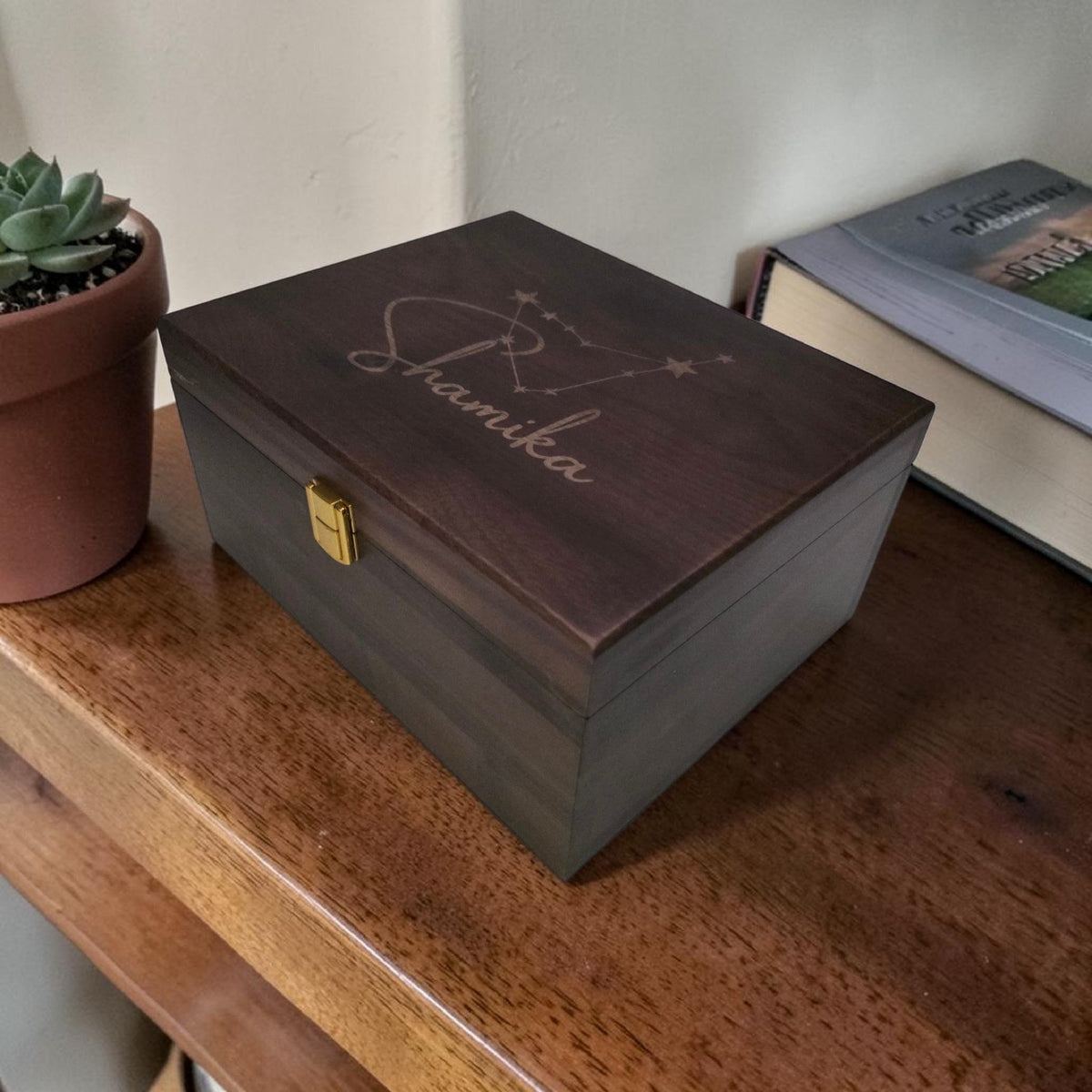 Newfashioned Relics personalized dark walnut wooden keepsake box engraved with a zodiac constellation and name